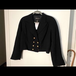 Cropped black jacket with gold buttons